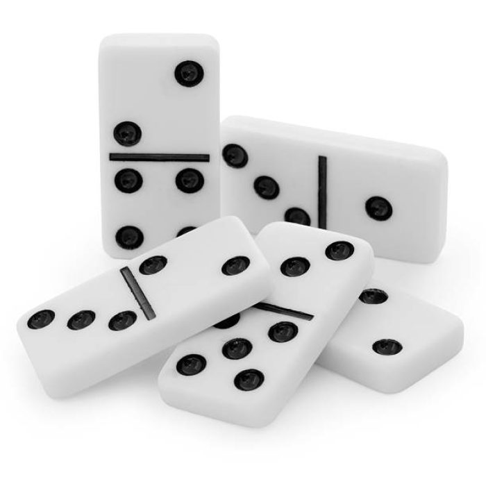 Pile from bones of a dominoes with black dots